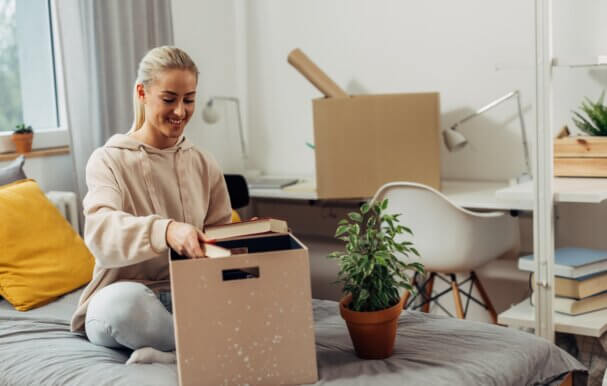 A student unpacking boxes at her student accomodation in Winchester University.